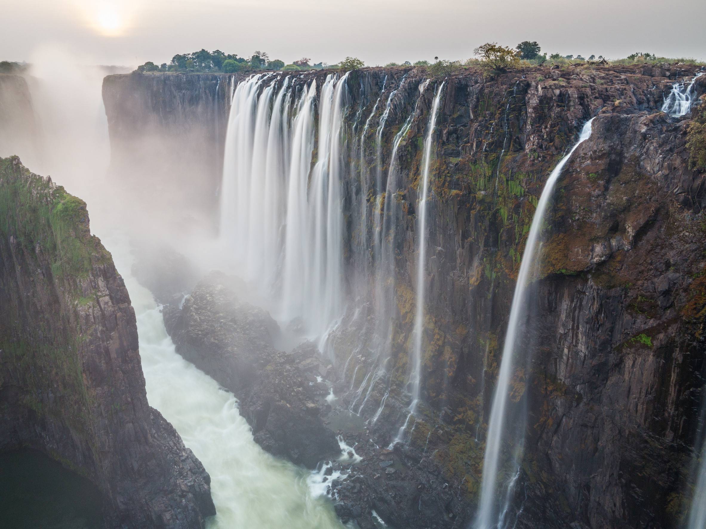 Victoria Falls Sunset Zambia Side With Zambezi River Red Suns