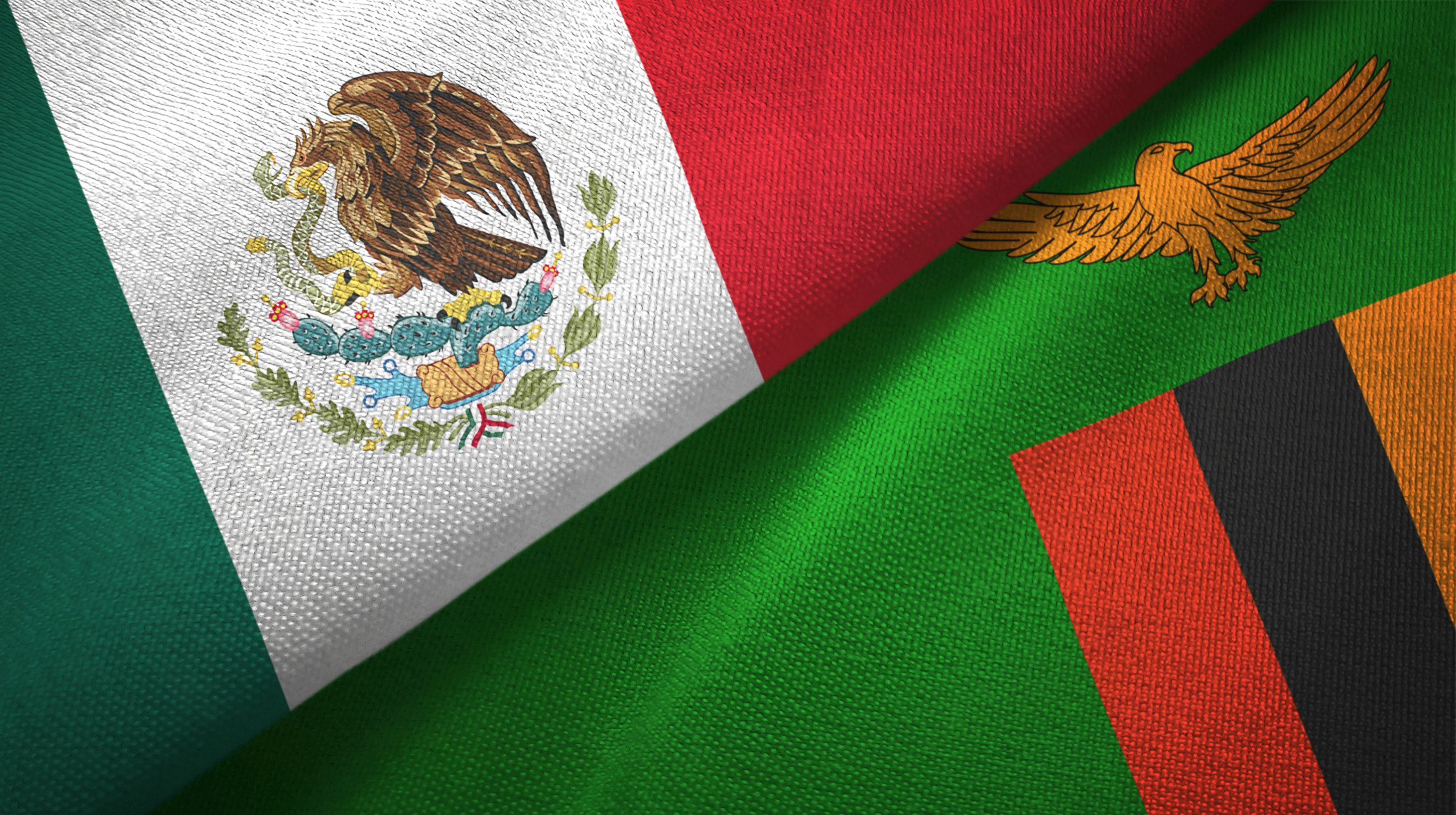 The flags of Mexico and Zambia side-by-side